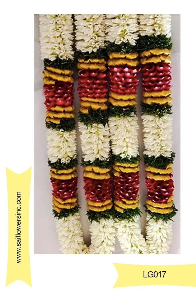 Lily Sampangi with Gold Ribbon, Red Rose Petals and Green Border